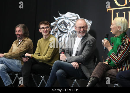 Left to right; actors Ian Beattie, Isaac Hempstead Wright and Liam Cunningham, with costume designer Michele Clapton (right) at the launch of the Game of Thrones touring exhibition at the Titanic Exhibition Centre in Belfast. Stock Photo