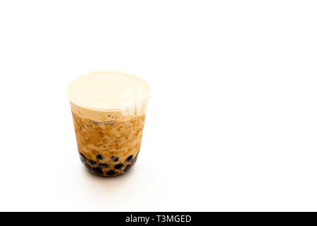 Pearl milk tea with cream on top isolated in clipping path. Stock Photo