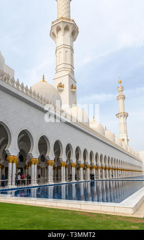 Abu Dhabi, UAE - March 31. 2019. Colonnade of Sheikh Zayd Grand Mosque Stock Photo