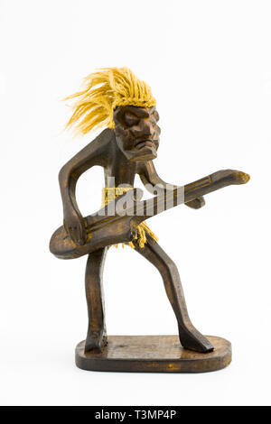 Wooden figure of a man with a guitar on a white background Stock Photo