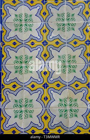 Detail of the traditional Portuguese colonial tiles (azulejos) from facade of old house in Sao Luis, Brazil Stock Photo