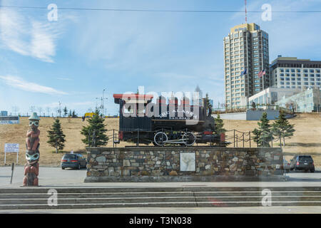 Anchorage, Alaska - May 24, 2013: This steam engine number 1, seen through a car window, sits in front of the Anchorage Train Depot on W. 1st Ave. Stock Photo