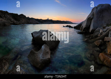 The amazing wind carved rocky sculptures at the beach of Cala Spinosa,a beautiful small bay surrounded by huge granite rocks at Capo Testa in the nort Stock Photo
