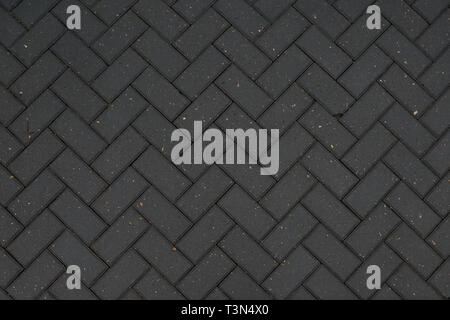 Texture of road tiles with herringbone pattern Stock Photo