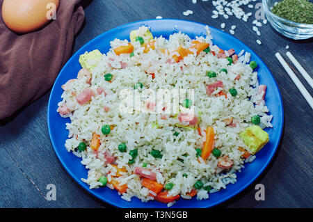 rice 3 delights in bamboo fiber dish with resin sticks Stock Photo