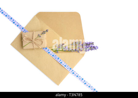 Fresh lavender flowers and envelopes on white background Stock Photo