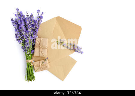 Fresh lavender flowers and envelopes on white background Stock Photo