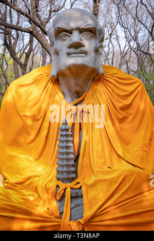Facial expression of Buddha, Thousand Buddha Mountain Public Park, Jinan, Shandong Province, China Stock Photo