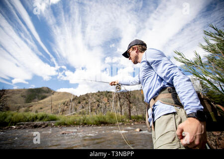 Fly fisherman in Colorado. Stock Photo