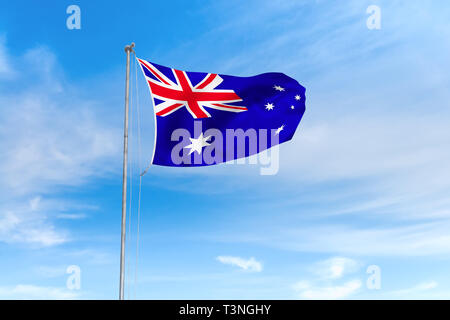 Australia flag blowing in the wind over nice blue sky background Stock Photo