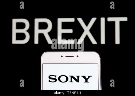 Hong Kong. 5th Apr, 2019. In this photo illustration a Japanese multinational technology conglomerate corporation Sony logo is seen on an Android mobile device with a Brexit message in the background. Credit: Budrul Chukrut/SOPA Images/ZUMA Wire/Alamy Live News Stock Photo