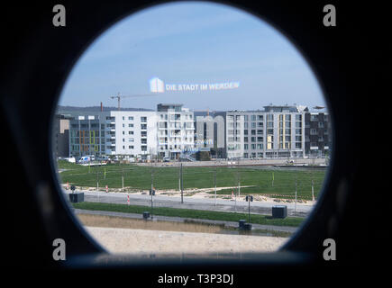 Heilbronn, Germany. 11th Apr, 2019. 'The city in the making' is about to open the Federal Horticultural Show in a telescope above the buildings of the city exhibition. The Federal Garden Show will take place from 17 April to 6 October. Credit: Sebastian Gollnow/dpa/Alamy Live News Stock Photo