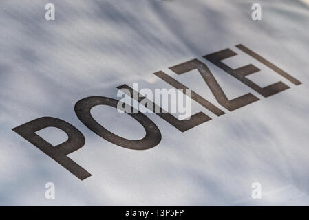 Police lettering in German on a car Stock Photo