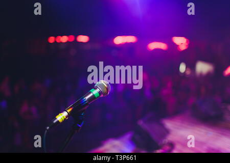 microphone against blur on beverage in pub and restaurant background Stock Photo