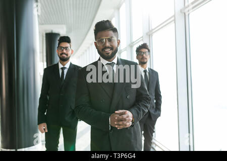 Happy asian Business colleagues outside the office talking to each other. Stock Photo