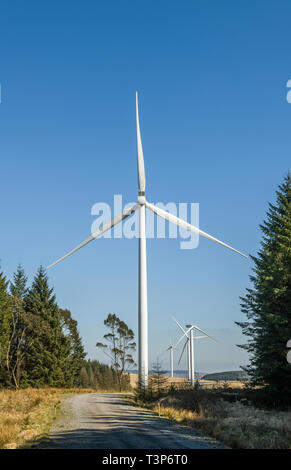 Wind Turbine Generating Electricity on the hills above the Rhondda Valley. This area has several large wind farms to increase green energy output.. Stock Photo