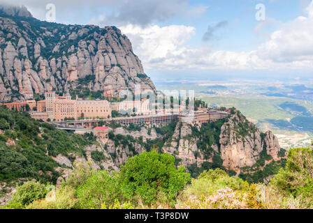 Santa Maria de Montserrat Abbey in Monistrol de Montserrat, Catalonia, Spain. Famous for the Virgin of Montserrat. Stock Photo