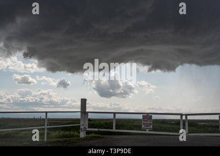 A lowering of a rotating mini-supercell in Colusa county, northern California, in late March 2019. Stock Photo