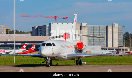 Kloten, Switzerland - September 29, 2016: a Dassault Falcon 7X airplane at Zurich airport. The Dassault Falcon 7X is a large-cabin business jet manufa Stock Photo