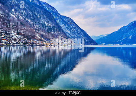 Hallstattersee lake and historical town of Hallstatt are the pearls of Salzkammergut region, located in Dachstein Alps, Austria. Stock Photo