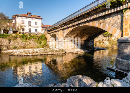 Cangas de Onis, Spain - March 31, 2019: Bridge over Sella River in Asturias Stock Photo