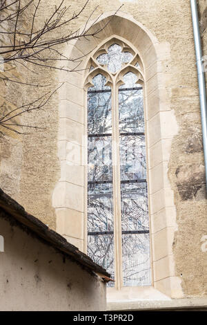 Stained-glass lancet window of the gothic Saint John the Baptist chapel in Sopron, Hungary Stock Photo