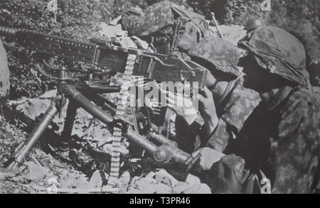 service weapons, Germany until 1945, heavy machine gun 37 (t), Czech ZB 1937, two German soldiers, maybe of the Waffen-SS, with a MG 37 (t), early 1940s, Editorial-Use-Only Stock Photo