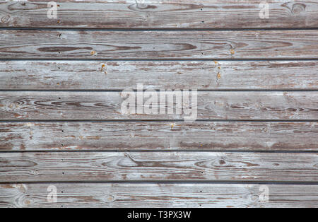 Close-up image showing the texture of distressed painted wooden panels Stock Photo