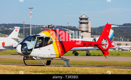 A Eurocopter EC 120B Colibri helicopter at Zurich airport Stock Photo