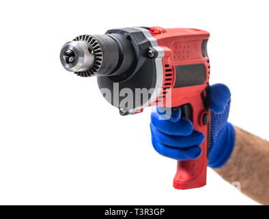 new electric drill in male hand on white isolated background Stock Photo