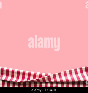 Red checkered fabric on pink color background.For decoration key visual layout Stock Photo