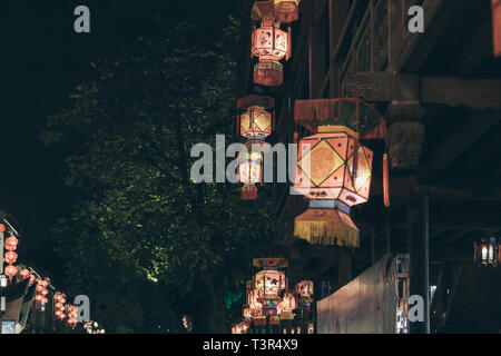 Sanfang Qixiang (Three Lanes and Seven Alleys), Fuzhou, China - 05 April 2019: People visiting the famous travel destination and walking on the Street Stock Photo