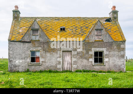 A semi-derelict abandoned croft on North Uist. Stock Photo