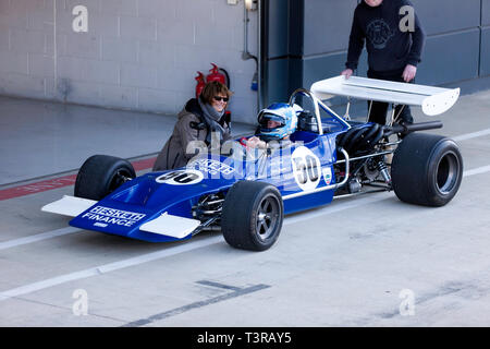 Paul Bason sitting in the cockpit of his 1971, March 712, formerly driven by James Hunt,  during the 2019 Silverstone Classic Media/Test Day Stock Photo