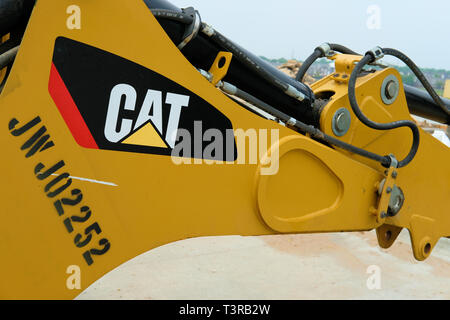 Caterpillar CAT logo up-close on an excavator construction equipment ...