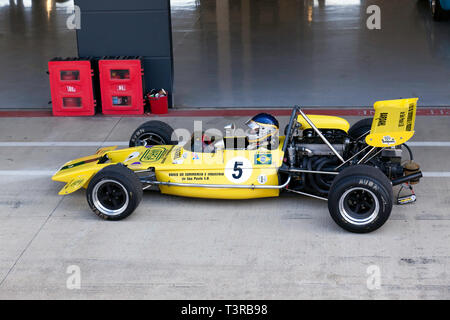 Roger Bevan driving his yellow, 1971, Lotus 69, during the media/test   day of the 2019 Silverstone Classic. Stock Photo