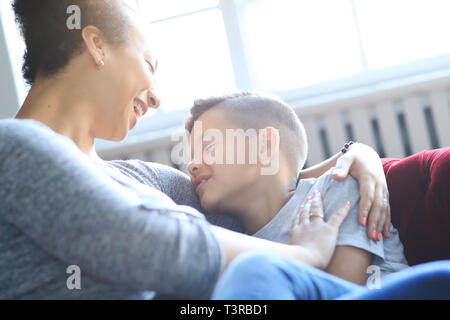 Loving mother with son at home Stock Photo