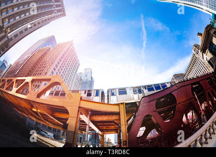 Train passing by over bridge of Chicago transport Stock Photo