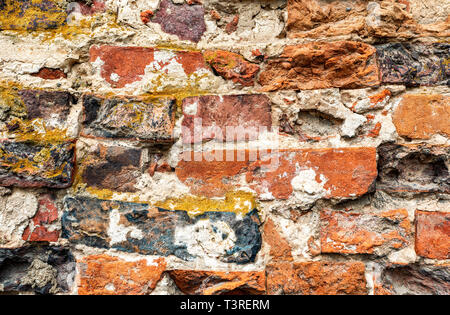 Grunge red brick wall as background texture. Bricks masonry Stock Photo