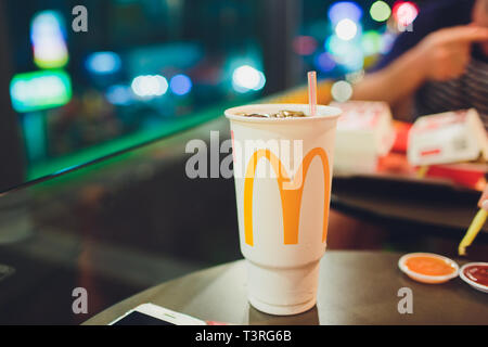 Patong, Thailand - February 22, 2019: Coca Cola paper cup, mcdonalds. Stock Photo