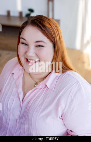 Portrait of a happy cheerful young woman Stock Photo