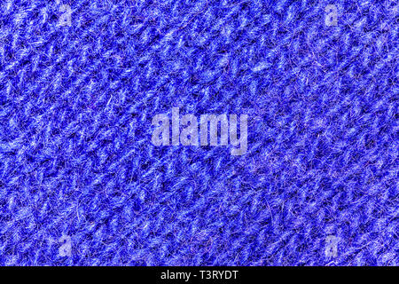 Macro view on the blue wool texture background. Very close macro photo on the pattern. Stock Photo