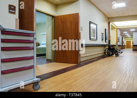 Empty hallway in assisted living facility Stock Photo