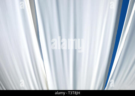 white white fabric texture wind blowing background, texture of flying fabric. Stock Photo