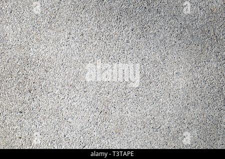 small gravel texture in the ground, pebble background Stock Photo