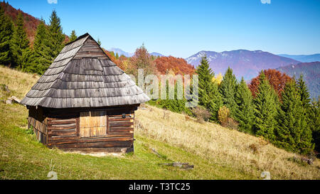 Hubová, Slovakia. 14 October, 2018. Traditional wooden shed used to store hay for sheep at meadows above Hlboká valley near Hubová, Slovakia. Stock Photo