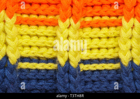 Multicolored Knitwear Sweater Fabric Texture. Bright saturated background Stock Photo