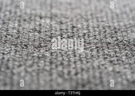 Texture of the Gray Nylon Carpet. Textile Background with Copy Space Stock Photo