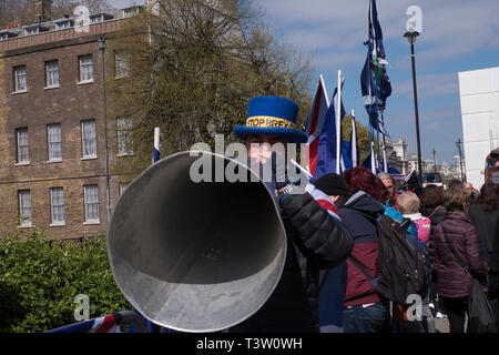 Remain protester with megaphone outside parliament in Westminster London Stock Photo