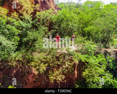 Man and woman on the Cerro Koi at Aregua in Paraguay Stock Photo